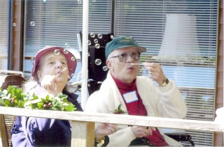 Honey and Granddad Hoisington celebrate at their grandson's wedding in May 2005.