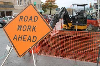 How long? Town officials anticipate it will take two more weeks before repair work on Spring Street is complete.