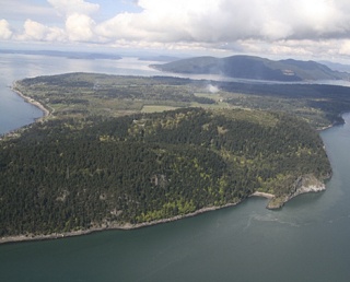 Guemes Mountain rises up from Square Harbor on the east side of Guemes. It is known for its wildflowers and unobstructed panoramic views of Mount Baker