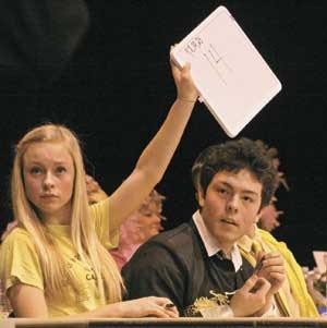 Members of the 2012 K-Bowl 2012 champion team Emily Guard and Ellery von Dassow await judgement during last year’s trivia contest fundraiser.