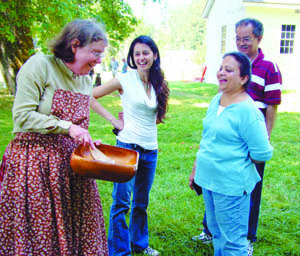 Author and educator Janet Oakley demonstrates mid-19th century pioneer domestic life.