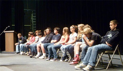 Competitors await their turn at the microphone in the 2011 Rotary Club sponsored spelling bee.