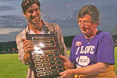 Former Friday Harbor football star Tyler Roberts displays the Wolverines “Hall of Fame” plaque. Roberts