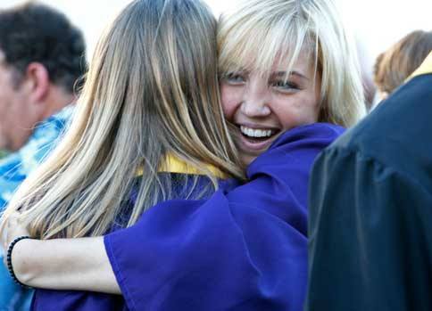 Genevieve Iverson shares an enthusiastic hug as the Friday Harbor High School Class of 2010 celebrates graduation -- the school's 98th Commencement ceremony -- Saturday