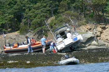 A US Coast Guard skiff is among the boats that were blown aground when heavy winds blew through Fossil Bay on Sucia Island