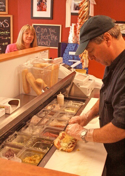 KO's Subs Ken Oberreit put the finishing touch on a sub sandwich