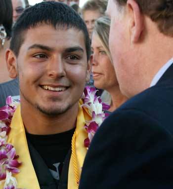 San Juan's Roy Taylor receives congratulations at Friday Harbor High School's 2011 graduation ceremonies.