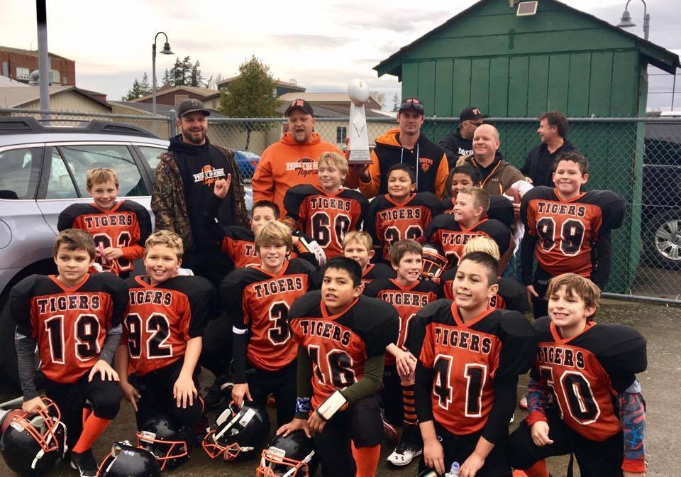 little-league-football-teams-win-championship-trophies-the-journal-of