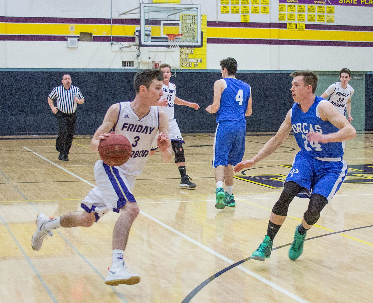 Staff photo/Greg Sellentin                                Eli Cooper-West drives to the basket during the first quarter.