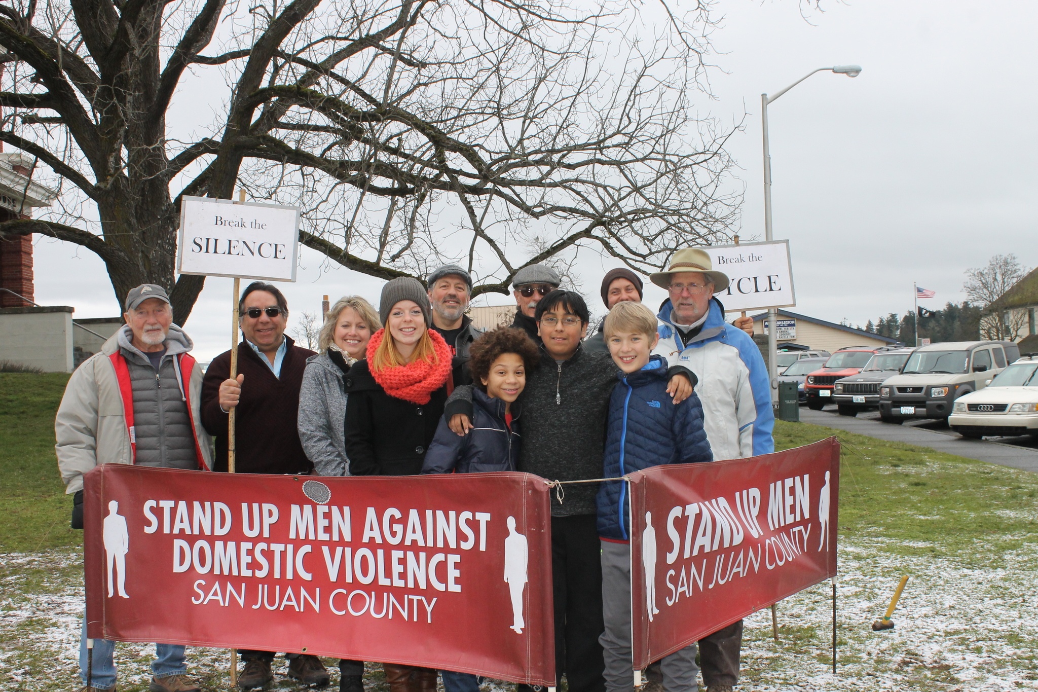 Staff photo/Heather Spaulding                                Seventh-grade boys join SAFE San Juans Stand Up Men outside San Juan County courthouse.