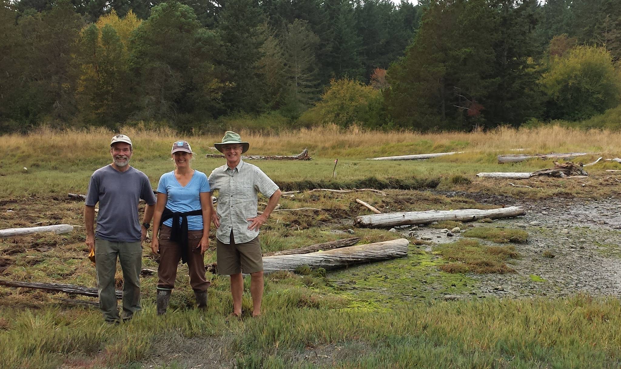 Contributed photo/Friends of the San Juans                                Tim Clark of the San Juan County Land Bank, Tina Whitman of Friends of the San Juans and landowner Jim Falconer pose at the site.