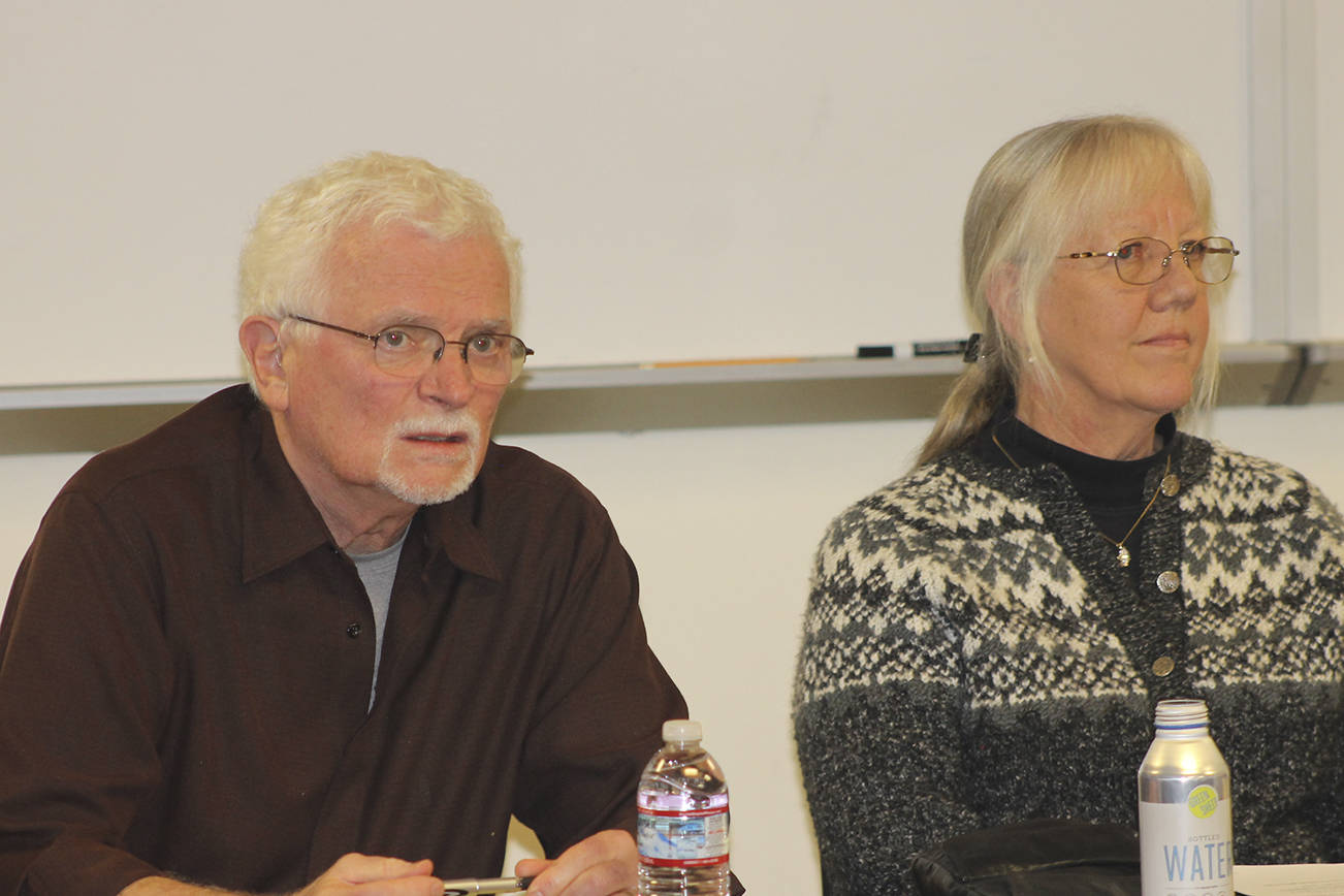 Staff photo/Heather Spaulding                                New commissioners Dr. Warren Appleton and Rebecca Smith take their seats on the board.