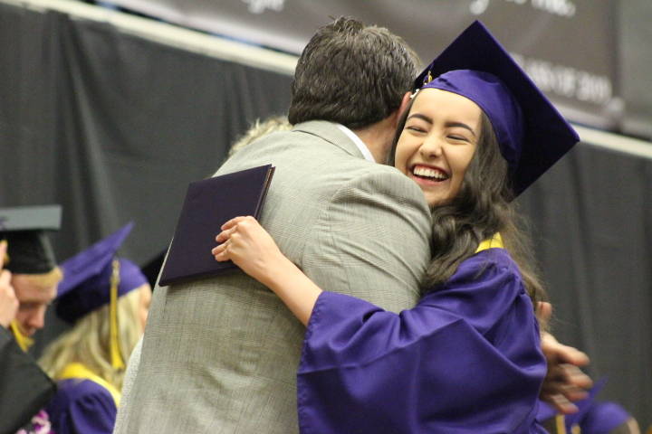 Friday Harbor Graduates throw their caps