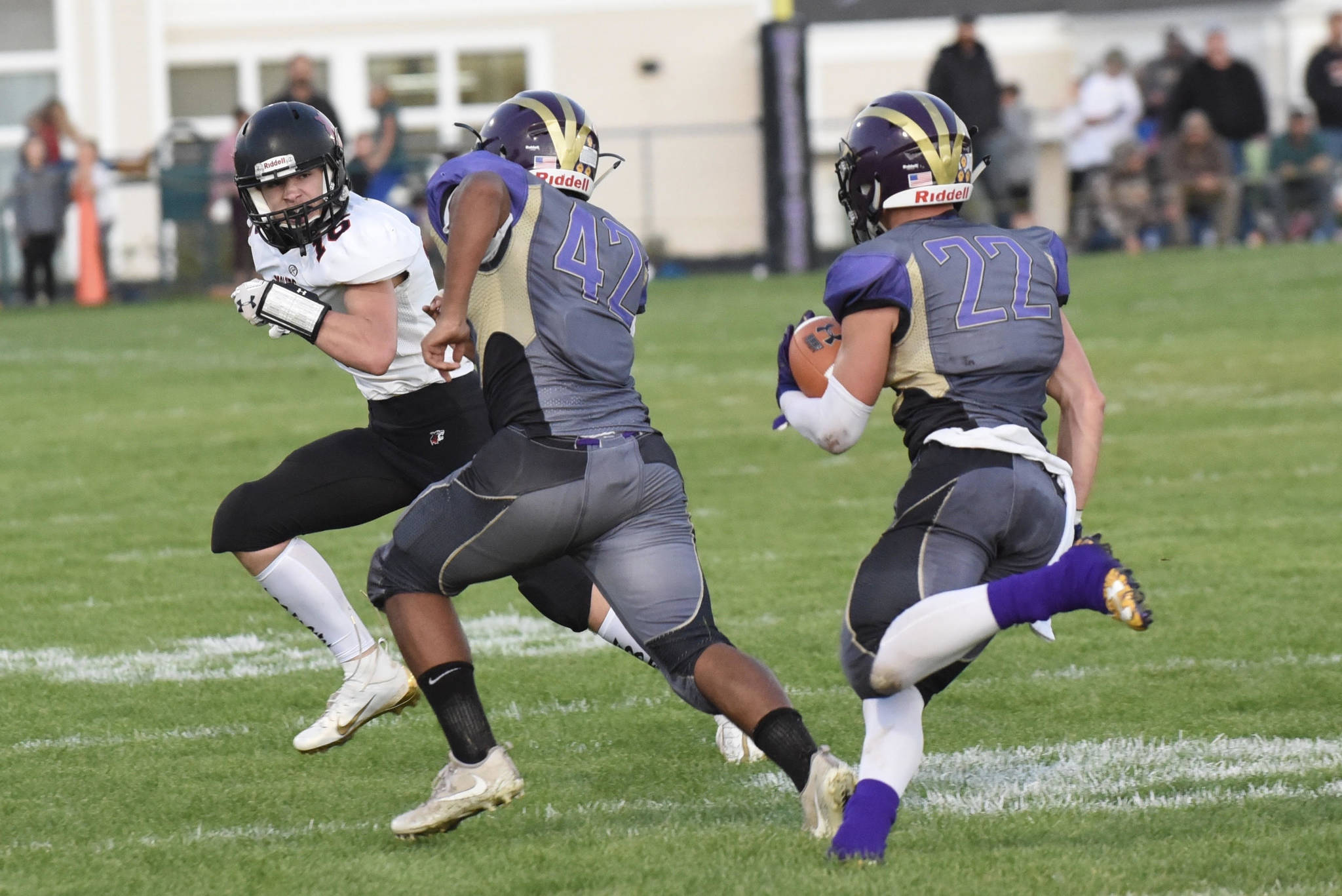 Mateo Blackmon, No. 42, clears the way for No. 22 Kyson Jackson on his way to scoring a touchdown. <em>(John Stimpson/Contributed photo)</em>