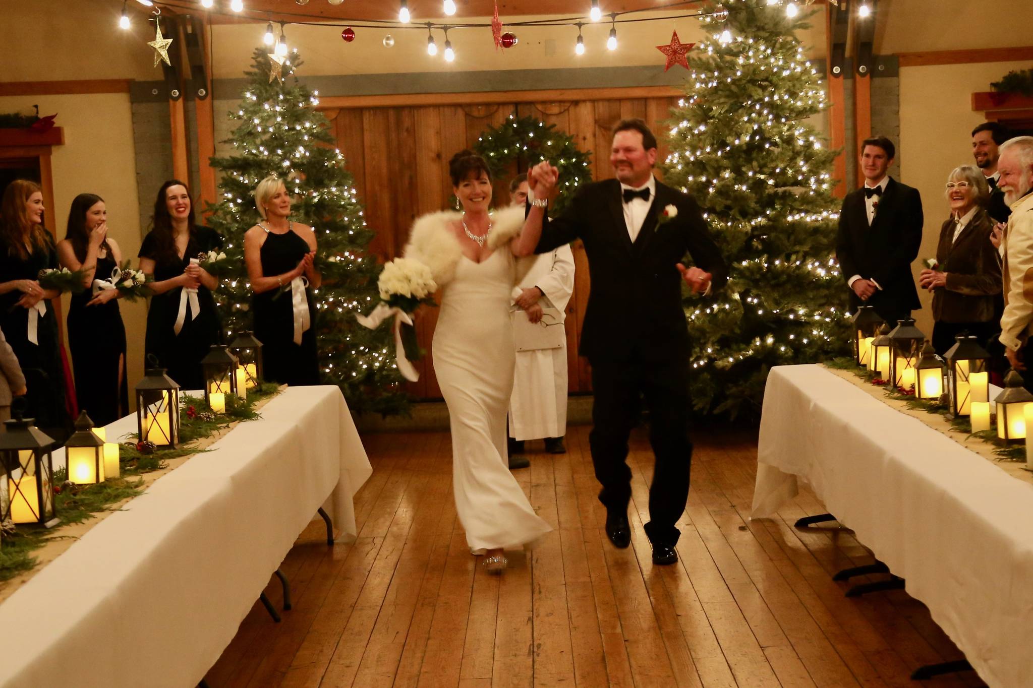 Contributed photo                                Regan Taylor and Dean Kinnaman walk down the aisle.