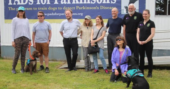 Heather Spaulding / Staff photo
From left to right: Allison Moalli and John Moalli with PADs dog, Bendy, Peter Ledochowitsch, Lisa Holt Jennifer Holland, Skip Lutz, Dominique Grandjean, Capucine Gallet, and Katy Barsamian with PADs dog, Ella in the front row