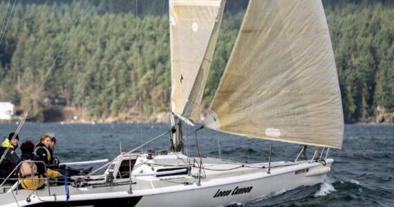 The Juvenile Delinquents aboard their boat, Loose Cannon, as they train to compete in the 710-mile race from Victoria B.C. to Ketchikan, Alaska.