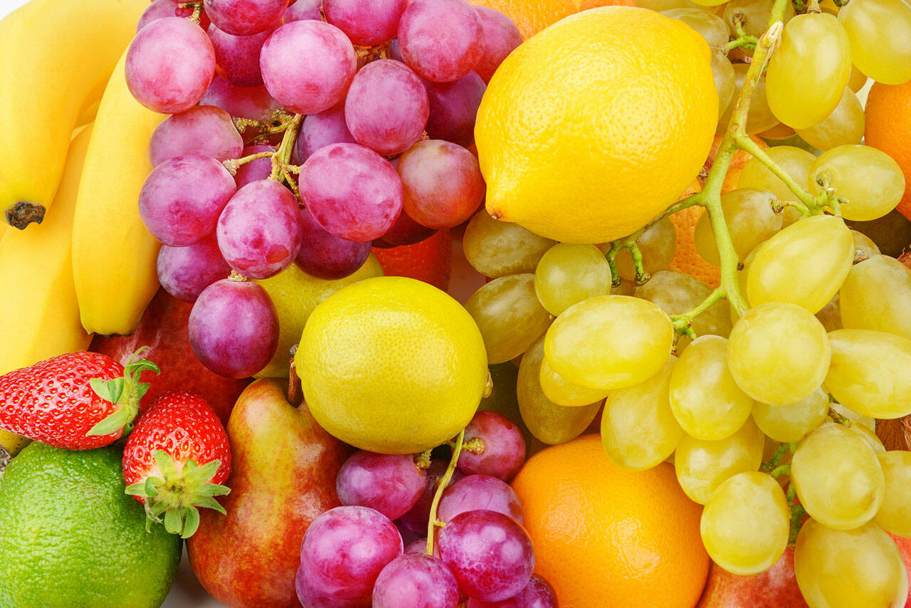 Bright beautiful background of ripe fruits. Organic healthy food.