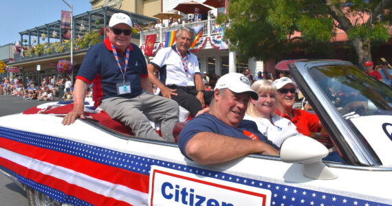 Kelley Balcomb-Bartok staff photo Citizens of Honor Donald Pollard and David Ralston feel the love during the 2023 Friday Harbor Fourth of July parade.