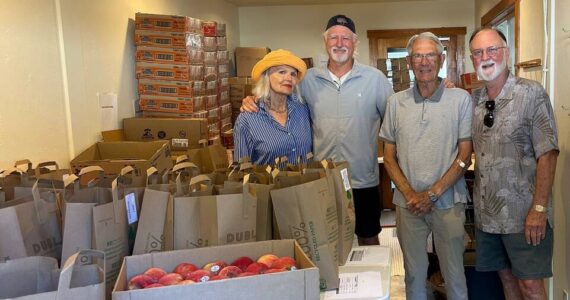 Contributed photo
Carla Wright, Paul Mayer, Dick Shorett and Steve Bowman packing food for 36 Weekends.