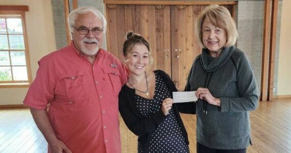 Contributed photo
President Sharon Hoope, right, presents the check to Izzy Graham, center, with Kiwanis Scholarship Chairman Jack Rice, left.