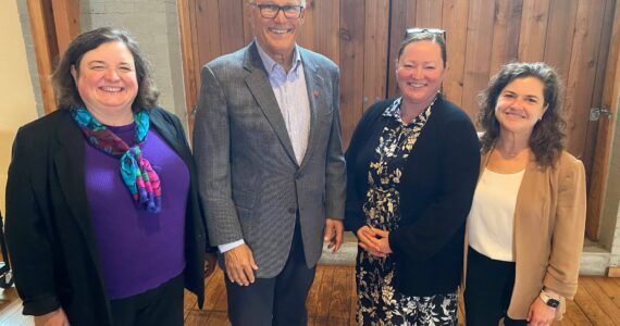 Contributed photo
Council member Cindy Wolf, Gov. Jay Inslee, Council member Christine Minney and Council Chair Jane Fuller.