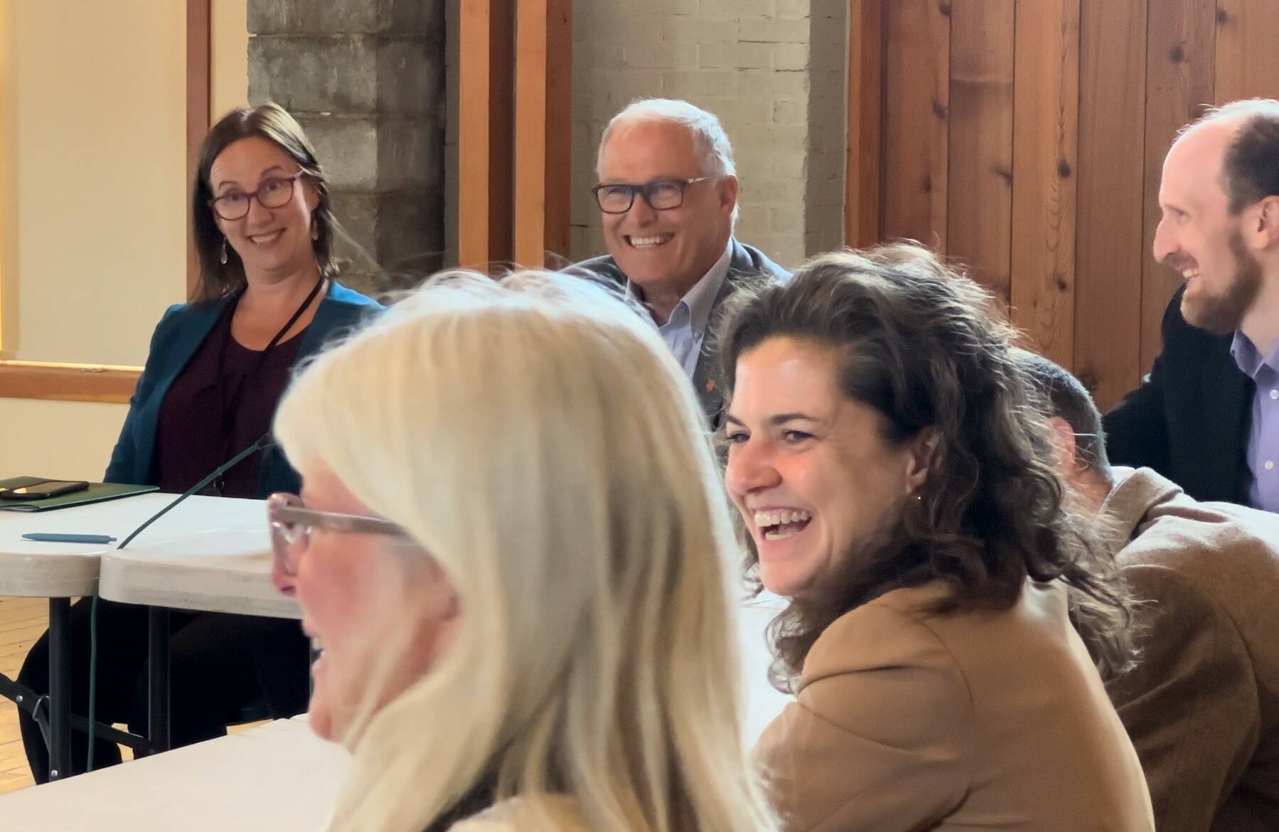 Contributed photo by Jeff Noedel at San Juan Today
San Juan County Council Chair Jane Fuller and Gov. Jay Inslee are all smiles at additional funding for local transportation.