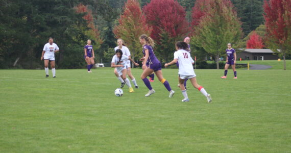 Contributed photo by Robert Rainier Spaulding
Wolverines take the ball downfield.