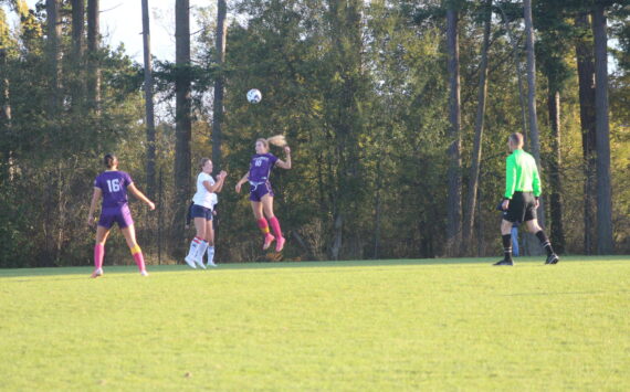 Contributed photos by Robert Rainier Spaulding
The Wolverines get control of the ball via head shot Oct. 24.