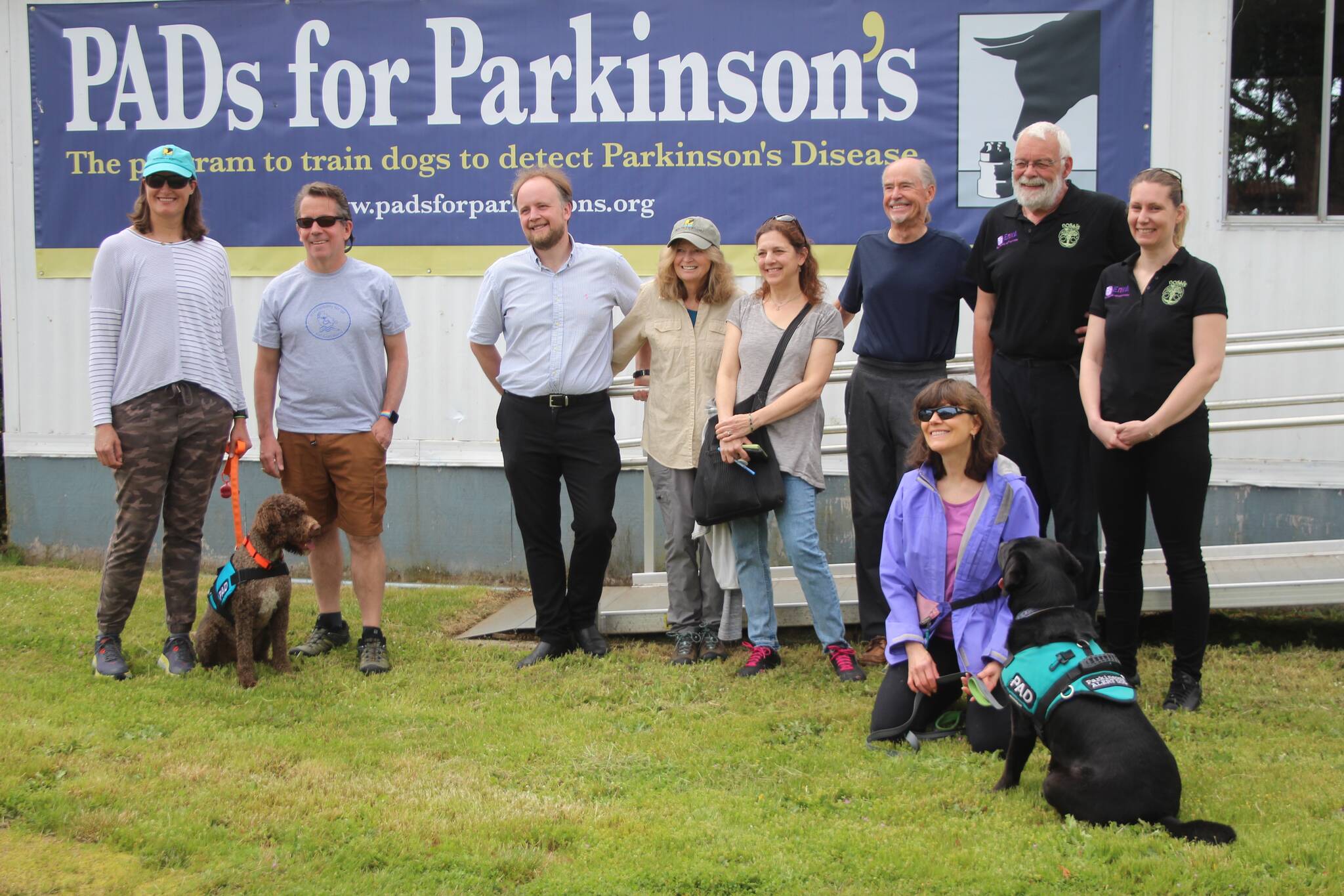 Heather Spaulding / Staff photo
From left to right: Allison Moalli and John Moalli with PADs dog, Bendy, Peter Ledochowitsch, Lisa Holt Jennifer Holland, Skip Lutz, Dominique Grandjean, Capucine Gallet, and Katy Barsamian with PADs dog Ella out in front.