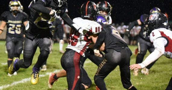 Contributed photo by John Simpson
Friday Harbor Wolverines soar over Coupeville Wolves 17-13.