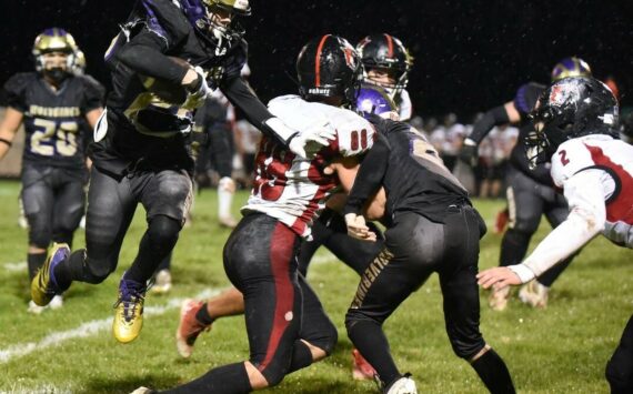 Contributed photo by John Simpson
Friday Harbor Wolverines soar over Coupeville Wolves 17-13.