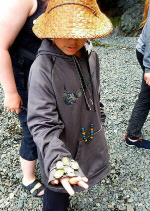 Contributed photo by Erin Licata.
A participant in the Madrona Institute’s Coast Salish Youth Stewardship Corps while on a Canoe Journey through the San Juan Islands.